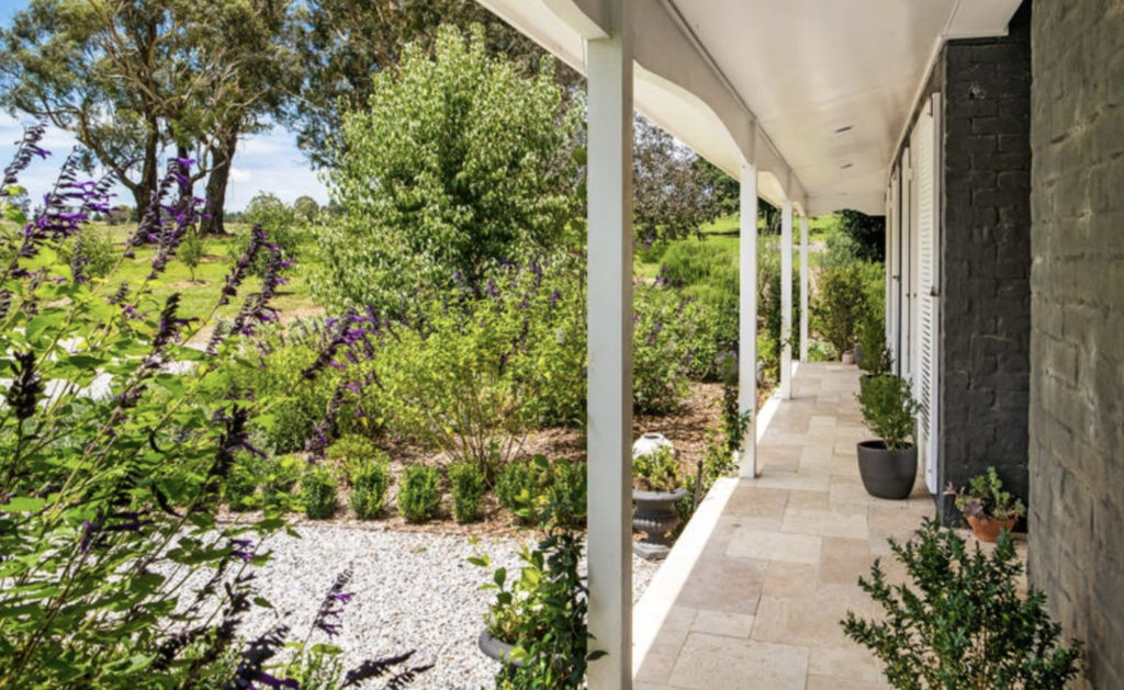 maintained garden and front porch